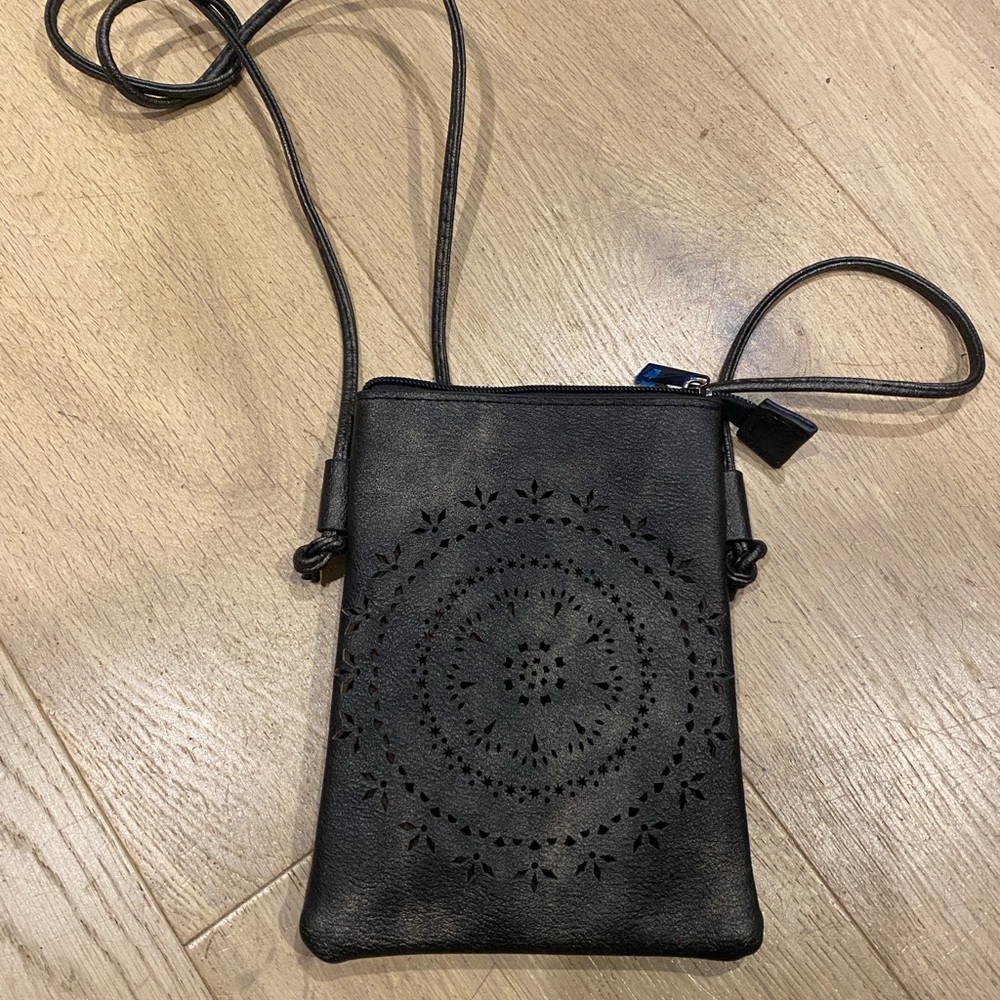 Elegant Black Crossbody Bag with Perforated Design